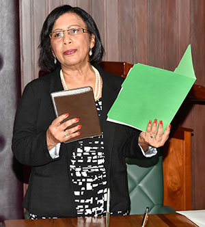 Chairman of the Public Procurement Commission, Mrs Carol Corbin as she takes the oath of office