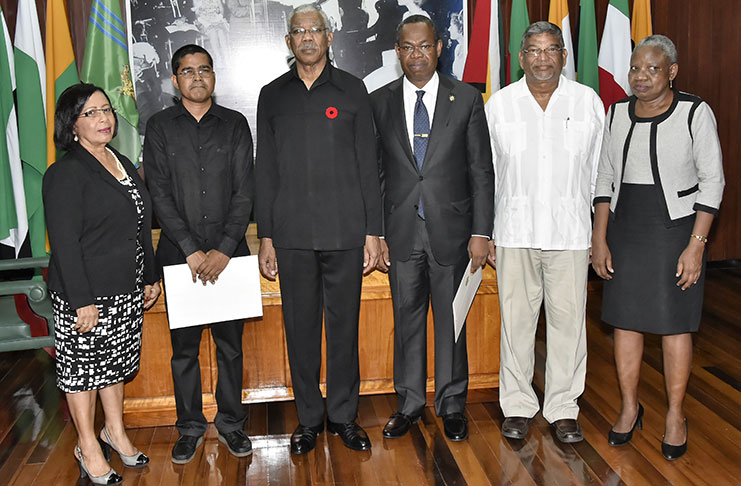 President David Granger and members of the Public Procurement Commission at the swearing in ceremony: (from left) Chairman of the Commission, Ms. Carol Corbin, Mr. Sukrishnalall Pasha, Mr. Ivor Burnette English, Dr. Nanda Kishore Gopaul and  Ms. Emily Dodson.