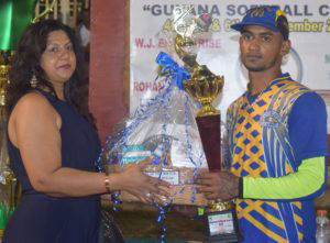 Man- of- the- Match Waiz Hussain collects his prizes         