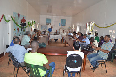 Mayor and Town Councillors of the Mabaruma municipality being addressed by Minister of Communities, Mr. Ronald Bulkan