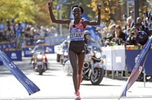 Mary Keitany of Kenya crosses the finish line to win the women’s field of the 2016 New York City Marathon in Central Park in the Manhattan borough of New York City, New York. REUTERS/Mike Segar 