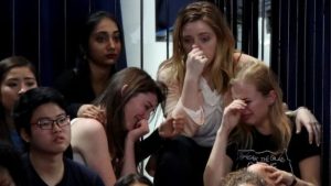 A group of Clinton supporters react as election results trickle in 