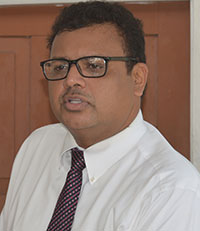 NIS Chairman, Dr Surendra Persaud 