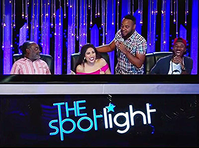 Co-host Sean Thompson gives Alana a jump scare, which judges Russel Lancaster (left) and Christian Sobers (right) find amusing