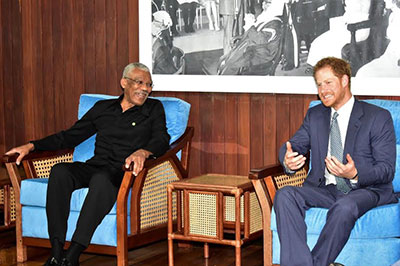 President David Granger shares a light moment with Prince Harry on friday