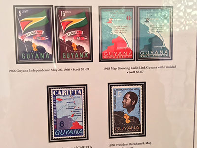 A cluster of Guyana Stamps includes one at bottom right, with the image of Guyana President Forbes Burnham