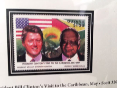 A Guyana Stamp with the images of US President Bill Clinton and President Cheddi Jagan