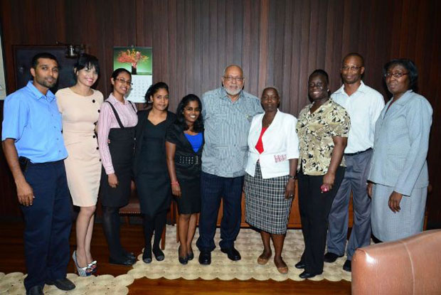 Staff of the Office of the President with President Donald Ramotar who celebrated his birthday yesterday