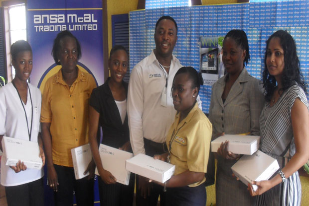 Always On-the-Go: From left winners Sara Scott, Donna Harcourt, Cindy Sargon, AMTL Brand Coordinator, Colin Baptiste, Onica Johnson, Marcia Job and Andrea Baksh.