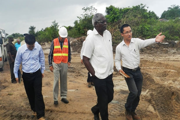 Minister Robeson Benn, along with other ministry and CJIA officials, was taken on a site visit where CHEC’s Engineers are removing the soft soil (peat) and backfilling the area with sand.