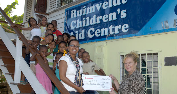 Scotiabank Marketing Manager Jennifer Cipriani presents the cheque to Jessica Hatfield, Patron of the RCAC