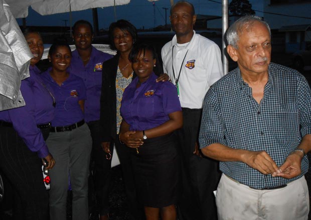 Ms. Tracy Lewis, General Manager of the Guyana Lotto Company, is flanked by employees of her company. In foreground is Mr. Vic Insanally