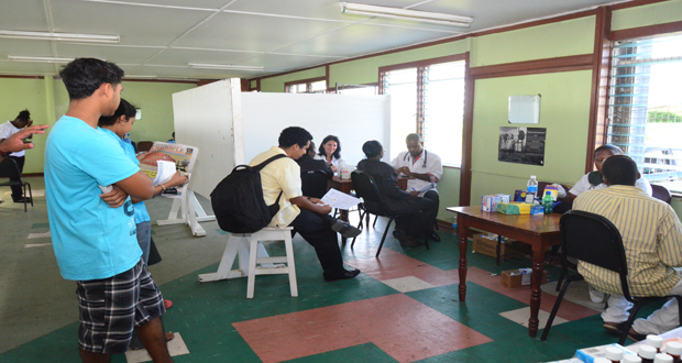 Persons taking advantage of the services offered at the health and wellness fair