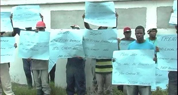 Some of the employees of Caricom Cement Inc protesting on Monday 