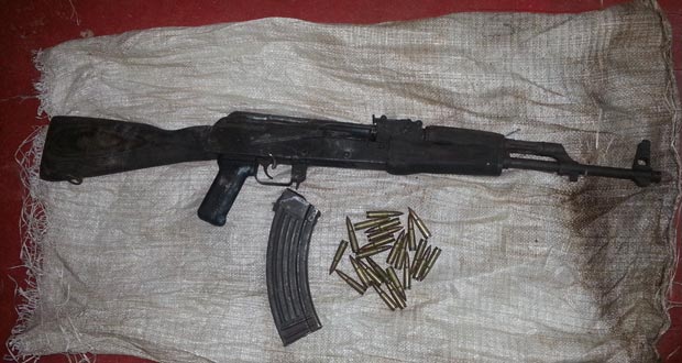 The AK47 rifle and ammo retrieved yesterday. (Police photo)