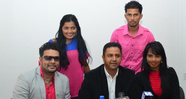 Sitting from left are television personality WR Reaz; Producer of the Chutney Soca Monarch in Trinidad, Mr George Singh; and Shivanie Latchman of Ishara Dance Troupe. Standing from left are Guyanese artistes Fiona Singh and Prince JP