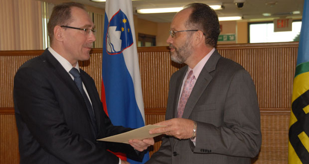 From left, Slovenia’s plenipotentiary representative to CARICOM, Dr. Bozo Cerar, presents letters of credence to CARICOM Secretary-General, Ambassador Irwin LaRocque.