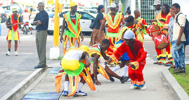 Masquerade dancers performing in Guyana