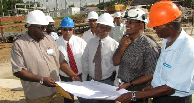 From right Project Coordinator Lennox McGregor, Chairman of the Guyana Power and Light (GPL) Board of Directors , Winston Brassington,