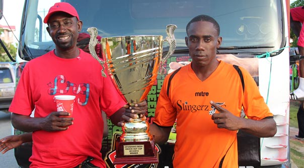 Slingerz FC striker Devon Millington with one of the club’s supporters during Sunday’s motorcade pit-stop in Den Amstel.