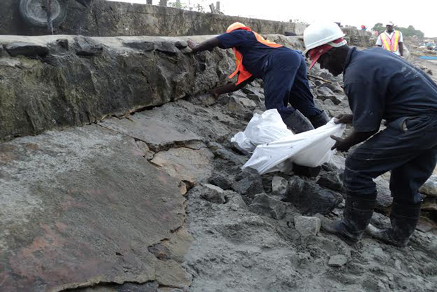 The Force Account Unit sealing the section with rocks.