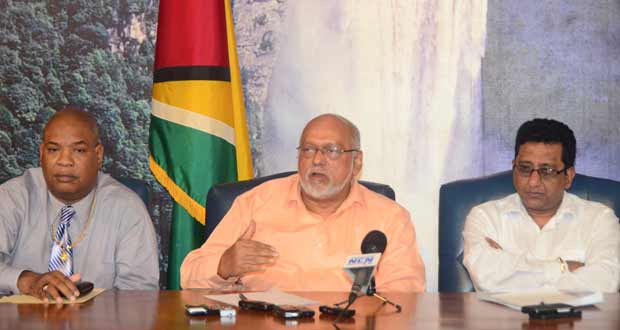 President Donald Ramotar, flanked by Minister Juan Edghill and Minister Anil Nandlall at yesterday’s news conference. (Adrian Narine photo)