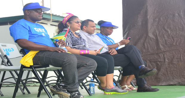 Officials of the sponsor, GT&T, are seen with Ministers Priya Manickchand and Dr. Frank Anthony (Adrian Narine photos)