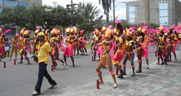 Part of the Digicel Mash Day float and costume parade