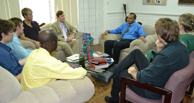 Minister Frank Anthony meeting with U.S. Ambassador to Guyana Brent Hardt and members of the visiting rock band Filligar, during a courtesy call on the minister yesterday.