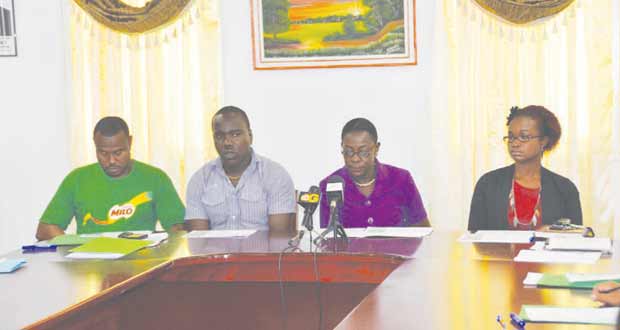 From left: Troy Mendonca, Nicolette Henry and Dr Ertenisia Hamilton listen attentively as Petra Organisation’s Marlon Cole delivers his remarks at the opening ceremony of the Gender Base Violence two-day seminar yesterday.