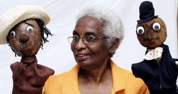Jean Small manipulates two puppets during a Portmore puppet show at the Lions’ Civic Centre during Portmore Week activities in 2008. – photo by Anthony