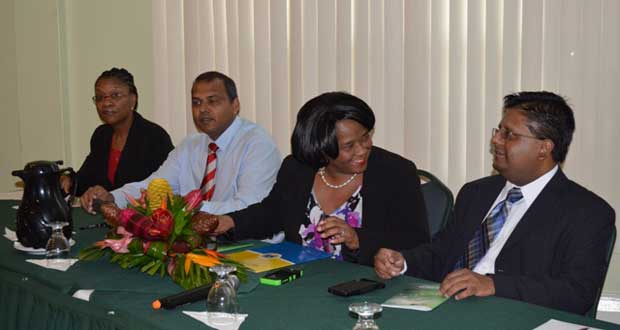 Minister of Finance, Dr. Ashni Singh; Minister of Culture, Youth and Spor,t Dr. Frank Anthony; Vice President (Corporate Services) and Bank Secretary, CDB, Yvette Lemonias-Seale; and Senior Technical Officer/Manager, Forest and Livelihood Programme, CNRI, Neila Bobb-Prescott at the Vybzing Guyana Workshop at Grand Coastal Inn