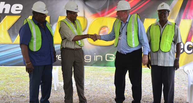 Minister of Natural Resources and the Environment Robert Persaud and CEO Troy Resources Ken Nilsson shake hands, with Clintion Williams -Chairman of GGMC and Patrick Harding – President of GGDMA looking on