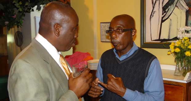 Mr. George Jervis Permanent Secretary of the Ministry of Agriculture and member of the Steering Committee of the Intra-ACP APP CARIFORUM countries project chats with a colleague during the project launch in Trinidad on Monday last