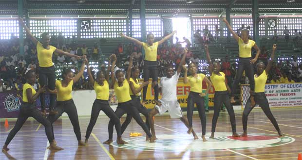 Dancers from President’s College perform a pyramid during the National Physical Display Competition yesterday at the CASH