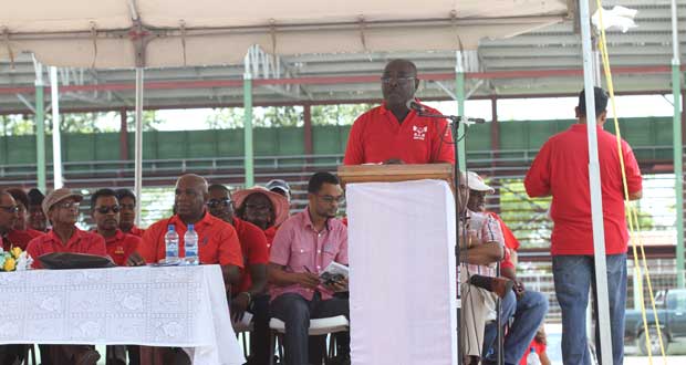FITUG President Carvil Duncan addresses the rally at the National Park