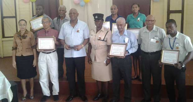 HM of St. Anne’s Primary, Melissa Isaacs, with former Commander of ‘A’ Division, George Vyphuis (second from left), and stakeholder representatives