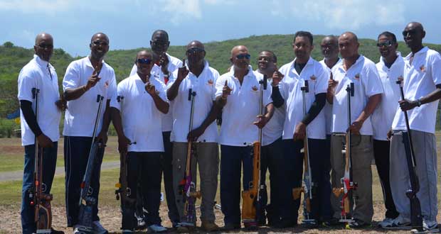 The triumphant Guyana team  pose with their rifles.