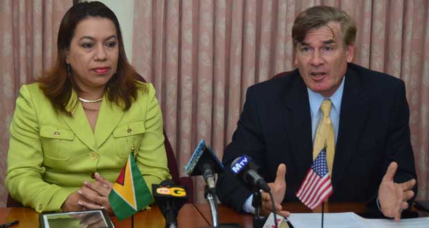 Minister of Foreign Affairs, Ms. Carolyn Rodrigues-Birkett, and U.S. Ambassador to Guyana, Mr. Brent Hardt after the signing of the crime-fighting agreement Thursday