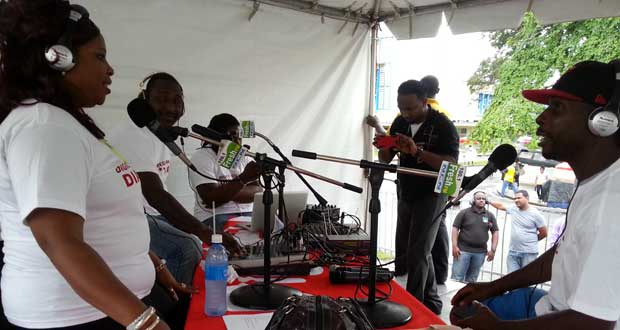 Radio show ‘Digicel Morning Vibez’ featuring DJ Casual, Big Red and Selector Face, and The Dread live yesterday outside Muneshwer’s on Water Street