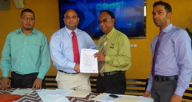 Sealed deal! Palm Court Managing Director Ravindra Prashad and Limacol CPL OPCO (Guyana) Inc. Operations Manager, Omar Khan confirmed the agreement. Sharing the moment are Palm Court General Manager Avalon Jagnandan (left) and NEW GPC Marketing Manager Trevor Bassoo. (Photo: Rajiv Bisnauth)