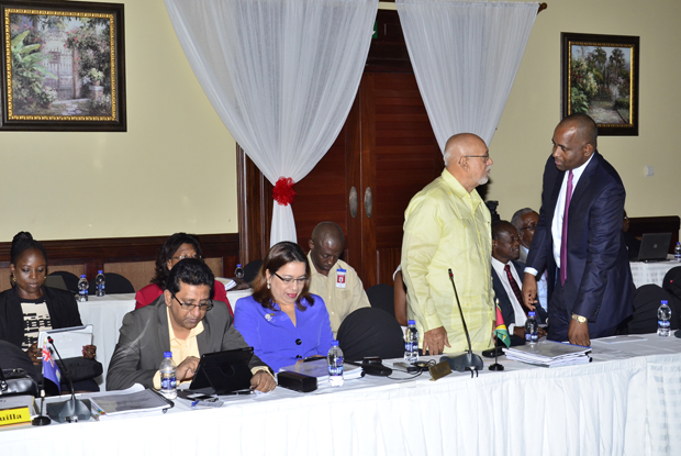 Guyana’s Head of State President Donald Ramotar chatting with Dominica’s Prime Minister Roosevelt Skerrit during the ongoing 35th  CARICOM Summit in Antigua. Also in photo, as part of the Guyanese delegation, are Attorney General Anil Nandlall, Foreign Affairs Minister Carolyn Rodrigues-Birkett and Director General at the Foreign Ministry Ambassador Elisabeth Harper. (Sandra Prince photo)