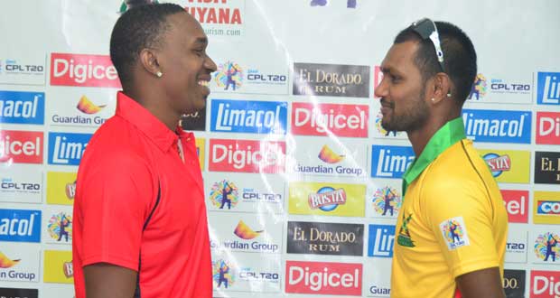 Friends today, Foes tonight! Guyana Amazon Warriors skipper Denesh Ramdin (right) faces up against his Red Steel counterpart, a smiling Dwayne Bravo, ahead of tonight’s important second round clash at the Guyana National Stadium, Providence. (Photo by Adrian Narine)