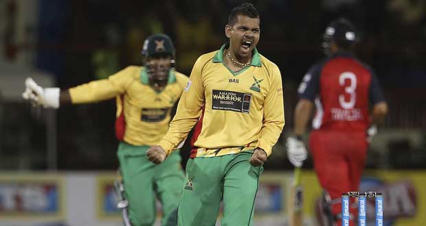 Let’s go Sunil, bamboozle them again! A pumped-up Sunil Narine celebrates after bowling the first maiden over in a T20 Super Over contest last Thursday night, when the Guyana Amazon Warriors defeated Red Steel. (Photo courtesy Getty Images)