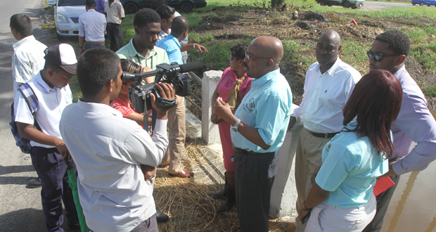Minister of Local Government and Regional Development, Mr. Norman Whittaker, addressing members of the media on the progress of canal de-silting in the presence of Acting Town Clerk, Ms. Carol Sooba; Coordinator of the Technical Committee of the ‘Cleanup Guyana’ Project, Mr. Gordon Gilkes; and other authorities