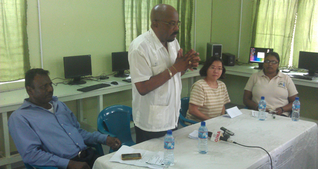 At the recommissioning of the Cotton Field ICT Hub. Seated from left are Regional Democratic Chairman Mr. Parmanand Persaud; Minister of Local Government and Regional Development, Mr. Norman Whittaker; UNDP Deputy Resident Representative, Ms. Chisa Mikami; and YEIRP participant and Chairperson of the day’s proceedings, Ms. Gangadai Persaud