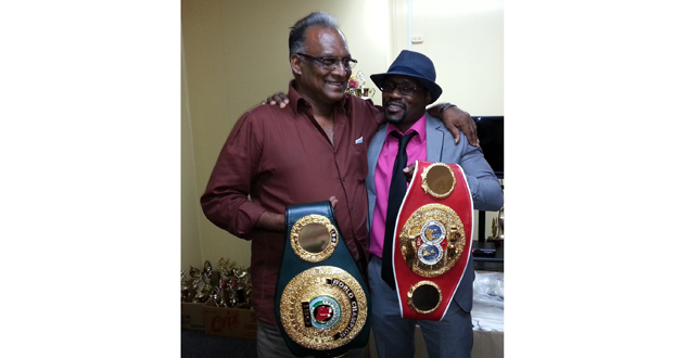 Congrats Gairy! Keep the flag flying high. These were the words uttered to two-time world boxing champion Gairy St Clair (right) who paid a courtesy call on Director of Sport Neil Kumar at his Middle Street office last Wednesday.