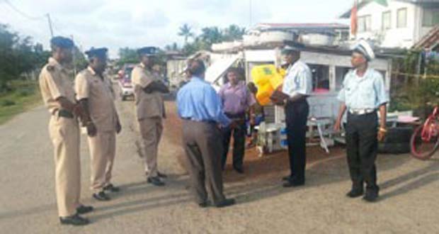 Berbice police interacting with members of the public