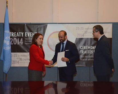 Minister of Foreign Affairs, Ms Carolyn Rodrigues-Birkett presenting the instruments to UN UnderSecretary-General for Legal Affairs, Mr. Miguel de Serpa Soares. Also in photo is Chief of the Treaty Section, Mr. Santiago Villalpando
