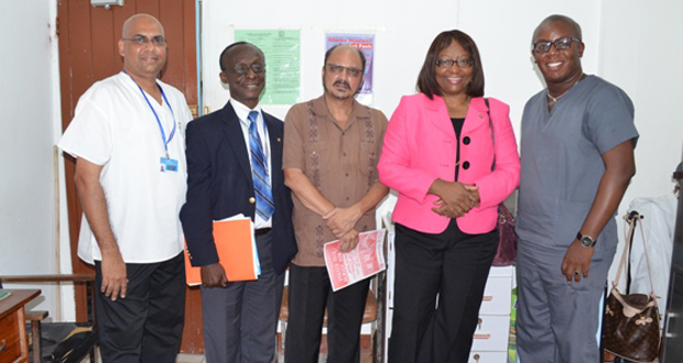 Director of the Pan American Health Organisation, Dr Carissa Etienne, Health Minister Dr Bheri Ramsaran, and PAHO Representative in Guyana, Dr Wiliam Adu-Krow, with the head doctor and the dentist of the Campbellville Health Centre